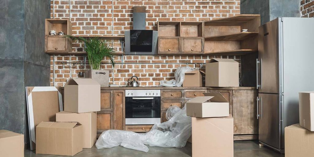 packing boxes in a kitchen