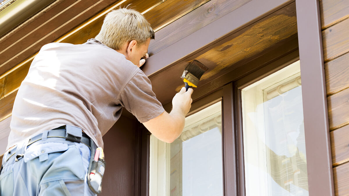 person repairing a house that needs to be sold