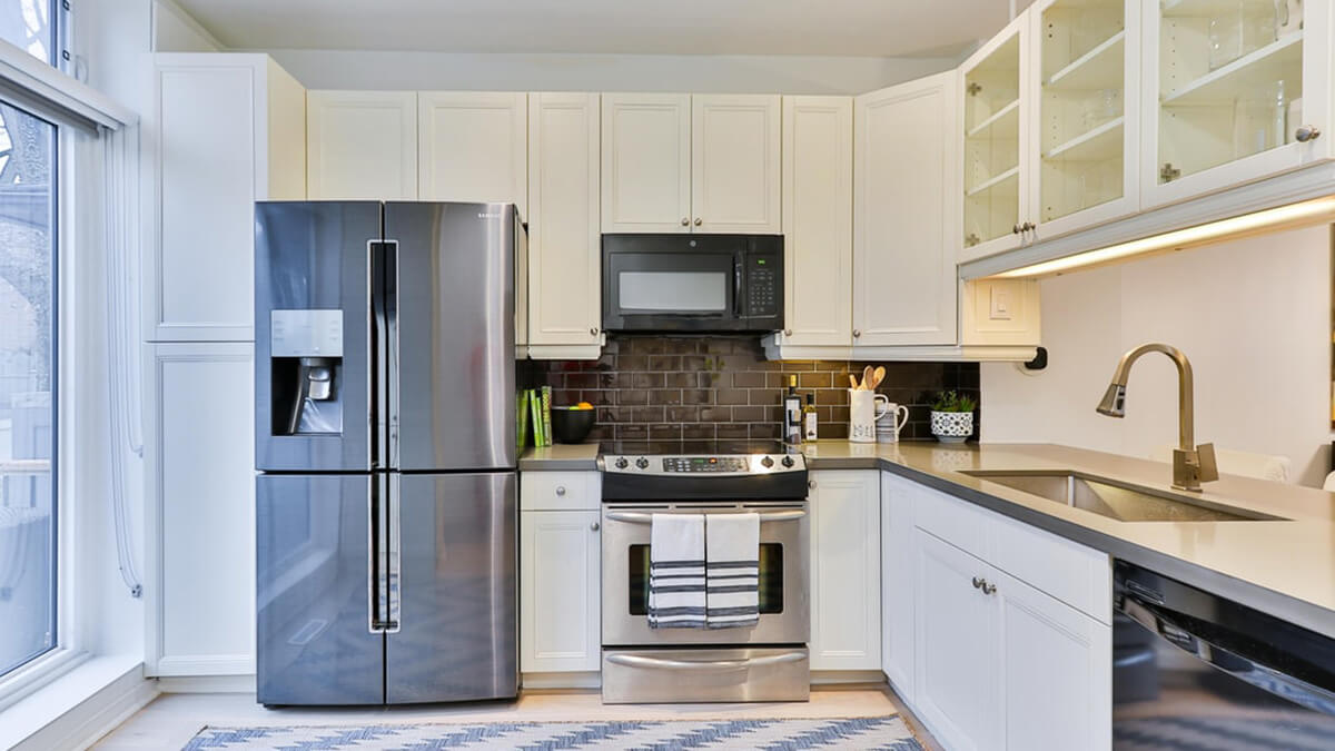 kitchen equipped with new stainless steel appliances